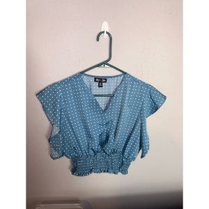Blue polka dotted blouse